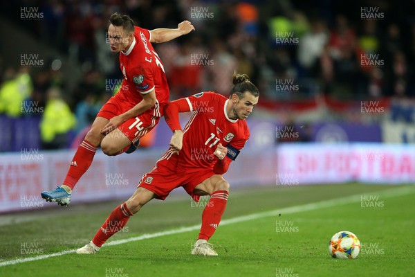 131019 - Wales v Croatia - European Championship Qualifiers - Group E - Connor Roberts leaps over Gareth Bale of Wales