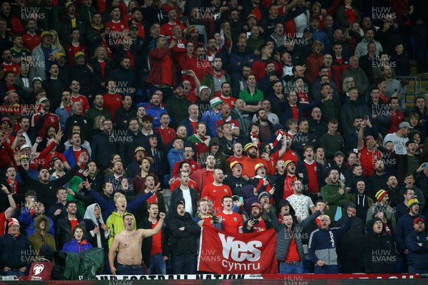 131019 - Wales v Croatia - European Championship Qualifiers - Group E - Wales fans during the anthem holding a Yes Cymru flag