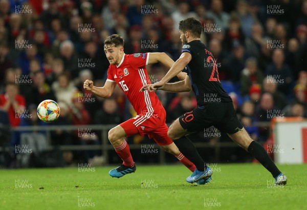 131019 - Wales v Croatia, UEFA Euro 2020 Qualifier - Tom Lockyer of Wales and Bruno Petkovic of Croatia compete for the ball