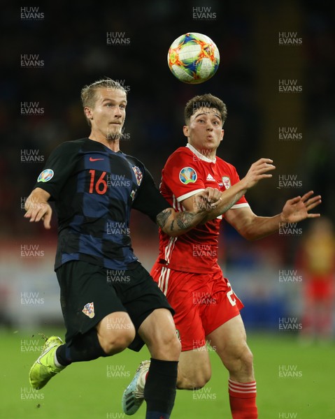 131019 - Wales v Croatia, UEFA Euro 2020 Qualifier - Tin Jedvaj of Croatia clears the ball as Daniel James of Wales challenges