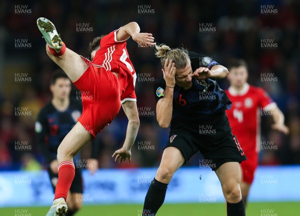 131019 - Wales v Croatia, UEFA Euro 2020 Qualifier - Daniel James of Wales and Tin Jedvaj of Croatia collide as they compete for the ball