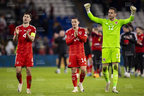151023 - Wales v Croatia - European Championship Qualifier - Wales' Ben Davies, Connor Roberts & Danny Ward celebrate at full time