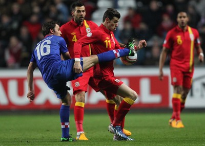 260313 - Wales v Croatia, World Cup Qualifier, Swansea - Wales' Gareth Bale and Croatia's Milan Badelj compete for the ball