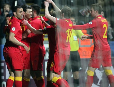260313 - Wales v Croatia, World Cup Qualifier, Swansea - Wales' Gareth Bale celebrates with team mates after he scores goal from the penalty spot