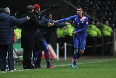 260313 - Wales v Croatia, World Cup Qualifier, Swansea - Croatia's Dejan Lovren celebrates after scoring his teams first goal