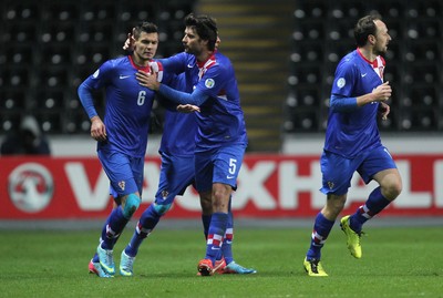 260313 - Wales v Croatia, World Cup Qualifier, Swansea - Croatia's Dejan Lovren celebrates after scoring his teams first goal