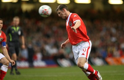11.10.06...Wales v Cyprus, Euro 2008 Qualifying, Cardiff. Wales' Jason Koumas heads home to score goal  