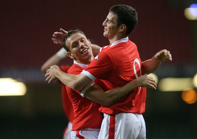 11.10.06...Wales v Cyprus, Euro 2008 Qualifying, Cardiff. Wales' Jason Koumas celebrates his goal with Craig Bellamy 