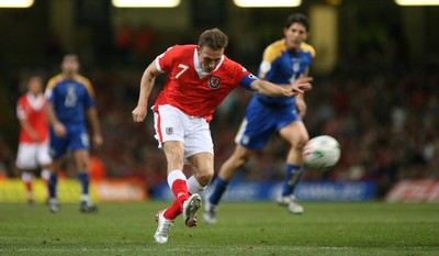 11.10.06...Wales v Cyprus, Euro 2008 Qualifying, Cardiff. Wales' Craig Bellamy chips the keeper to score Wales' third goal 