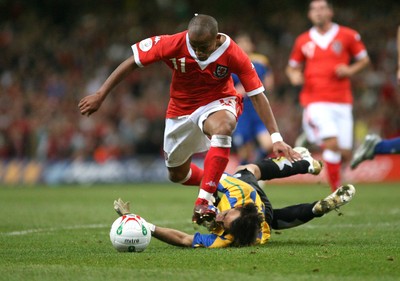 11.10.06...Wales v Cyprus, Euro 2008 Qualifying, Cardiff. Wales' Robert Earnshaw beats keeper Michalis Morphis but fails to find the back of the net 