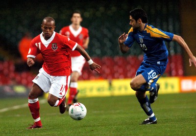11.10.06 - Euro 2008 Qualifying Match, Group D Wales v Cyprus Wales' Rob Earnshaw tries to beat Alexandros Garpozis 