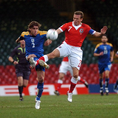 11.10.06 - Euro 2008 Qualifying Match, Group D Wales v Cyprus Wales Craig Bellamy and Georgios Theodotou compete 