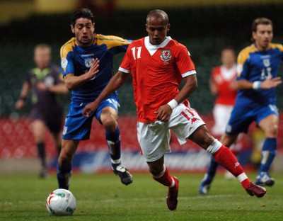 11.10.06 - Euro 2008 Qualifying Match, Group D Wales v Cyprus Wales Rob Earnshaw gets past Alexandros Garpozis 