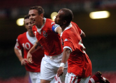 11.10.06 - Euro 2008 Qualifying Match, Group D Wales v Cyprus Wales' Rob Earnshaw (R) celebrates scoring his sides second goal with Craig Bellamy  