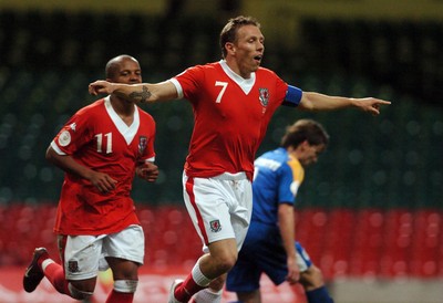 11.10.06 - Euro 2008 Qualifying Match, Group D Wales v Cyprus Wales' Craig Bellamy celebrates scoring his sides third goal 