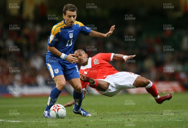 11.10.06...Wales v Cyprus, Euro 2008 Qualifying, Cardiff. Wales'  Robert Earnshaw is unended by Konstantinos Makridis 