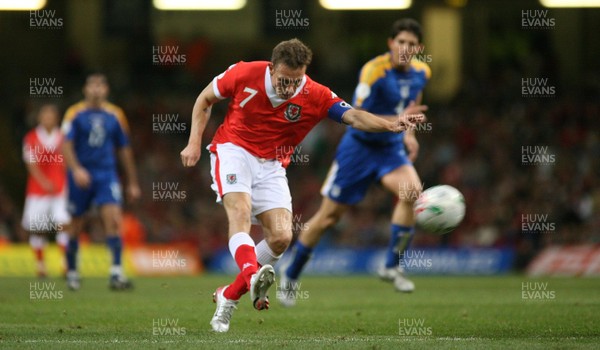 11.10.06...Wales v Cyprus, Euro 2008 Qualifying, Cardiff. Wales' Craig Bellamy chips the keeper to score Wales' third goal 