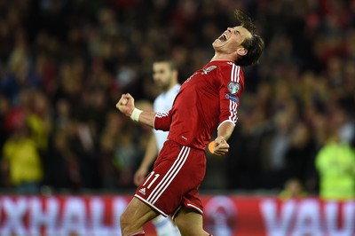 131014 - Wales v Cyprus - UEFA European Championship - Gareth Bale of Wales roars at full time as they win 2-1