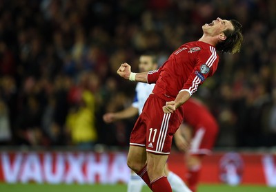 131014 - Wales v Cyprus - UEFA European Championship - Gareth Bale of Wales roars at full time as they win 2-1