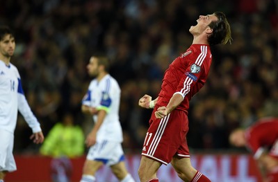131014 - Wales v Cyprus - UEFA European Championship - Gareth Bale of Wales roars at full time as they win 2-1