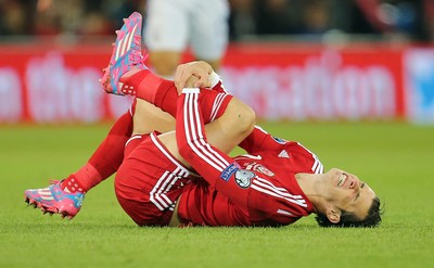 131014 - Wales v Cyprus, UEFA European Championship Qualifier - Wales' Gareth Bale is brought down by Marios Nikolaou of Cyprus