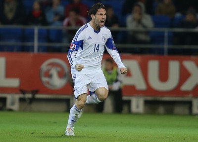 131014 - Wales v Cyprus, UEFA European Championship Qualifier - Vincent Laban of Cyprus celebrates after scoring goal