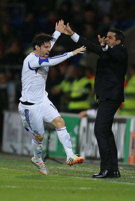 131014 - Wales v Cyprus, UEFA European Championship Qualifier - Vincent Laban of Cyprus celebrates with Cyprus manager Charalampos Christodoulou after scoring goal