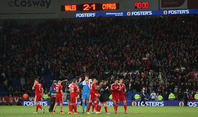 131014 - Wales v Cyprus, UEFA European Championship Qualifier - Wales players celebrate the win which put them top of the table