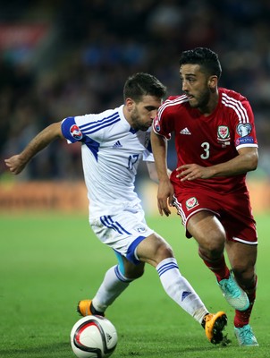 131014 - Wales v Cyprus, UEFA European Championship Qualifier - Wales' Neil Taylor gets past George Efrem of Cyprus