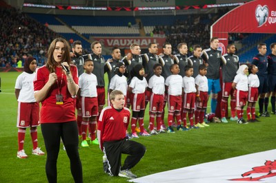 131014 - Wales v Cyprus, UEFA European Championship Qualifier - The teams line up for the national anthems