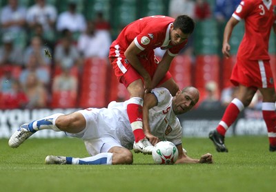 02.06.07. Wales v Czech Republic, Euro 2008 Qualifyer Wales' Joe Ledley tangles with Czech Republics' Jan Koller 