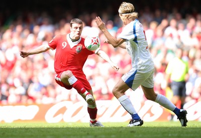 02.06.07. Wales v Czech Republic, Euro 2008 Qualifyer Wales' Jason Koumas is brought down by Czech Republics' Radoslav Kovac 
