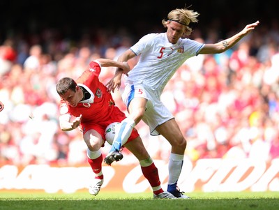 02.06.07. Wales v Czech Republic, Euro 2008 Qualifyer Wales' Jason Koumas is brought down by Czech Republics' Radoslav Kovac 