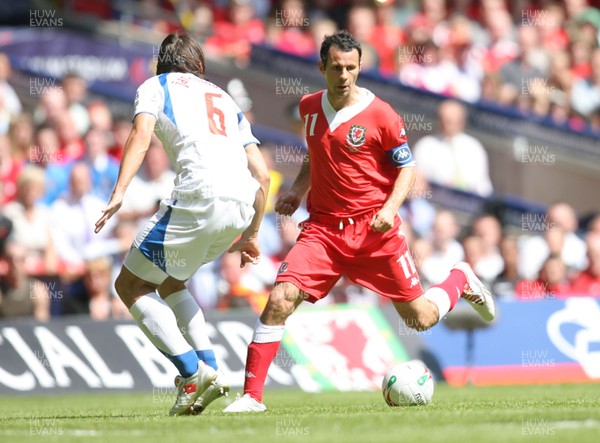 02.06.07. Wales v Czech Republic, Euro 2008 Qualifyer Wales' Ryan Giggs takes on Czech Republics' Marek Jankulovski 