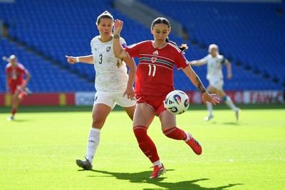 090626 - Wales Women v Czech Republic Women - 2027 FIFA Women's World Cup Qualifying - Hannah Cain of Wales is challenged by Eliska Sonntagova of Czech Republic