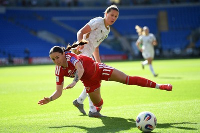 090626 - Wales Women v Czech Republic Women - 2027 FIFA Women's World Cup Qualifying - Hannah Cain of Wales is challenged by Eliska Sonntagova of Czech Republic