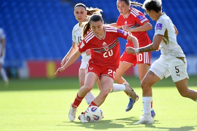 090626 - Wales Women v Czech Republic Women - 2027 FIFA Women's World Cup Qualifying - Carrie Jones of Wales is challenged by Katerina Kotrcova of Czech Republic