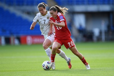 090626 - Wales Women v Czech Republic Women - 2027 FIFA Women's World Cup Qualifying - Carrie Jones of Wales is challenged by Antonie Starova of Czech Republic