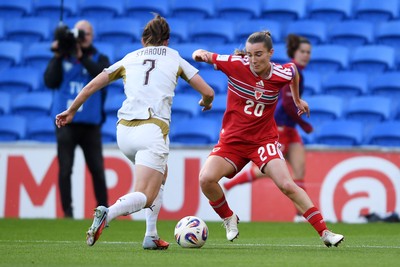 090626 - Wales Women v Czech Republic Women - 2027 FIFA Women's World Cup Qualifying - Carrie Jones of Wales is challenged by Antonie Starova of Czech Republic