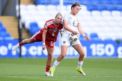 090626 - Wales Women v Czech Republic Women - 2027 FIFA Women's World Cup Qualifying - Rhian Roberts of Wales is challenged by Klara Cvrckova of Czech Republic