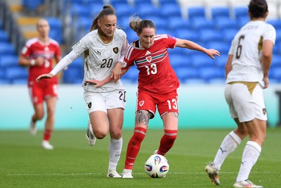 090626 - Wales Women v Czech Republic Women - 2027 FIFA Women's World Cup Qualifying - Sabina Strizova of Czech Republic is challenged by Rachel Rowe of Wales