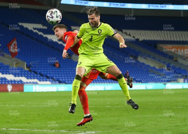 300321 Wales v Czech Republic, FIFA World Cup 2022 Qualifying match - Daniel James of Wales and Andrej Celustka of Czech Republic compete for the ball