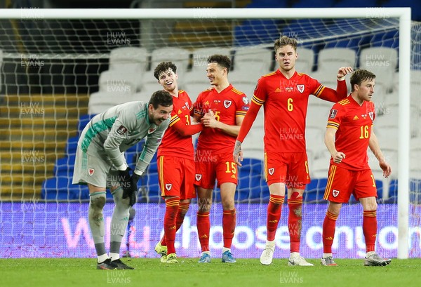 300321 Wales v Czech Republic, FIFA World Cup 2022 Qualifying match - Wales goalkeeper Danny Ward, Neco Williams, Ethan Ampadu, Joe Rodon and Joe Morrell celebrate at the end of the match
