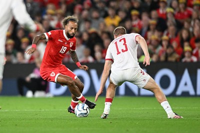 041026 - Wales v Denmark - UEFA Nations League - Sorba Thomas of Wales is challenged by Rasmus Kristensen of Denmark