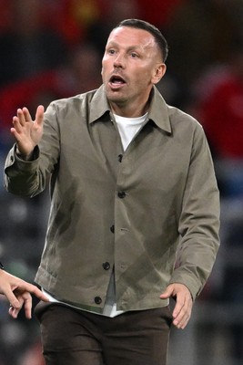 041026 - Wales v Denmark - UEFA Nations League - Craig Bellamy, Wales Manager debates  with Denmark assistant coaches 