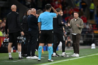 041026 - Wales v Denmark - UEFA Nations League - Craig Bellamy, Wales Manager debates  with Denmark assistant coaches 