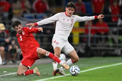 041026 - Wales v Denmark - UEFA Nations League - Neco Williams of Wales is challenged by Joakim Maehle of Denmark
