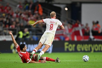 041026 - Wales v Denmark - UEFA Nations League - Ben Cabango of Wales is challenged by Oliver Provstgaard of Denmark