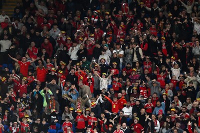 041026 - Wales v Denmark - UEFA Nations League - Wales fans wave phone lights in distraction for the Denmark penalty