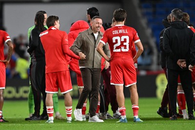 041026 - Wales v Denmark - UEFA Nations League - Craig Bellamy, Wales Manager and Joel Colwill of Wales at full time